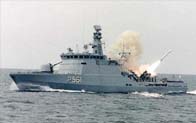 One of the FLYVEFISKEN Class launch a Harpoon missile