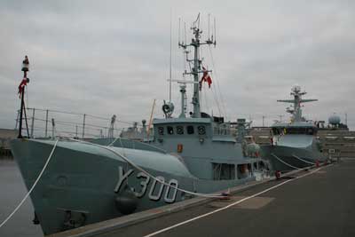 The patrol vessel DIANA in the background with the naval cutter BARS in font